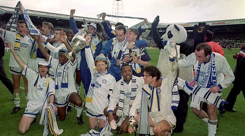 Leeds United squad celebrating their first division title triumph in the 1991/92 season.