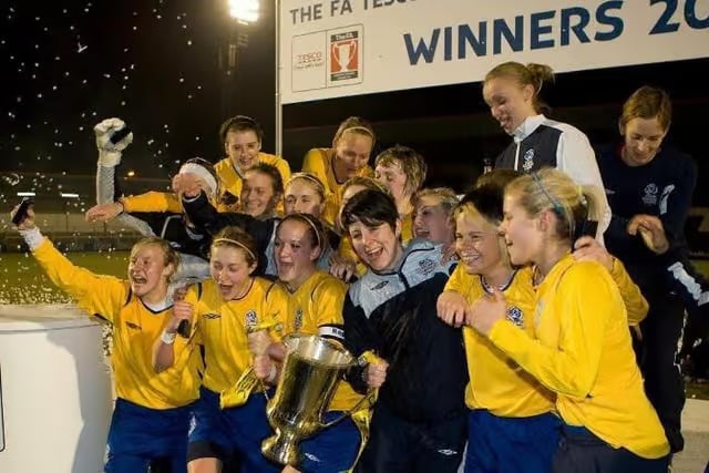 Leeds United Women celebrate winning the 2010 League Cup.