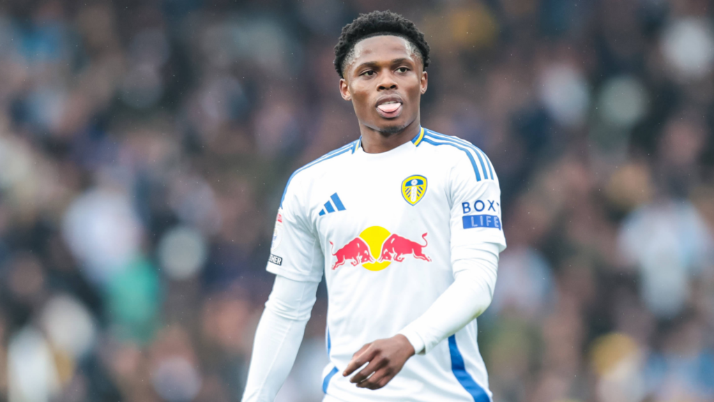 Largie Ramazani sticks his tongue out while in action for Leeds.
