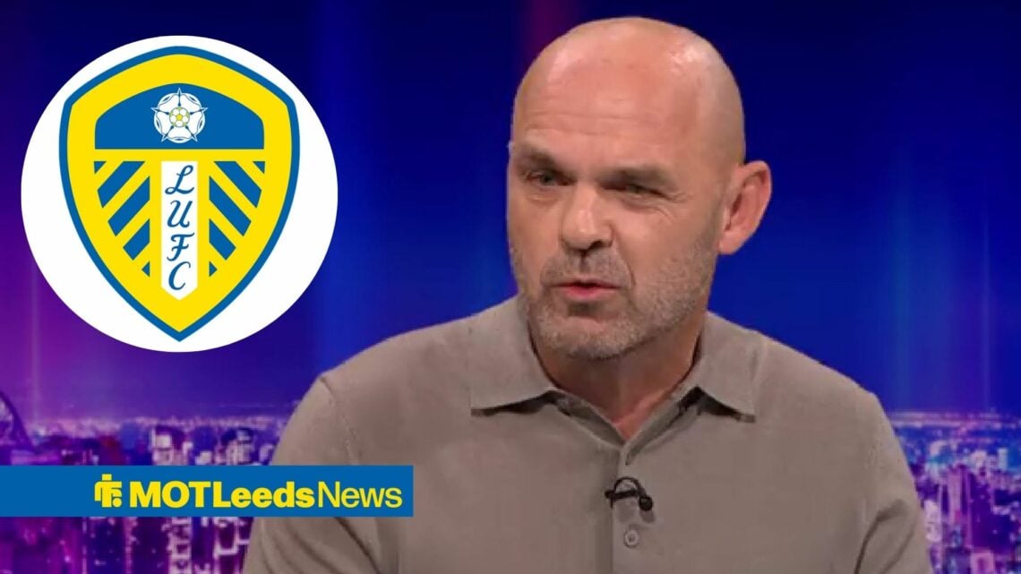 Danny Murphy looks impressed with Leeds badge in circular inset