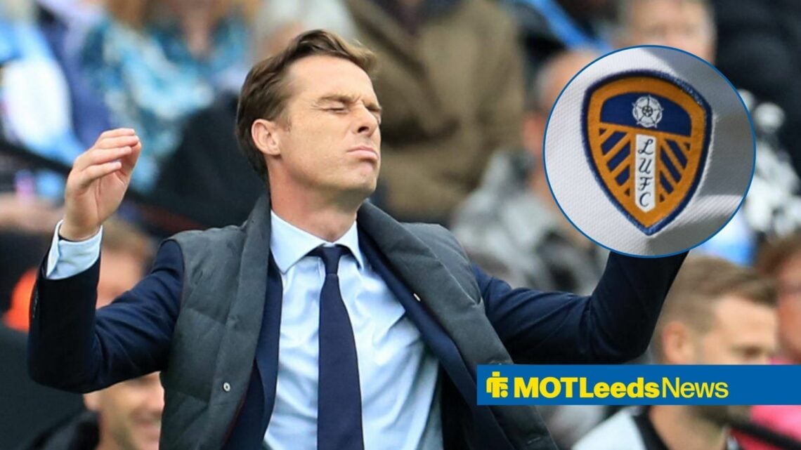 Scott Parker throwing arms in air with Leeds badge in circle