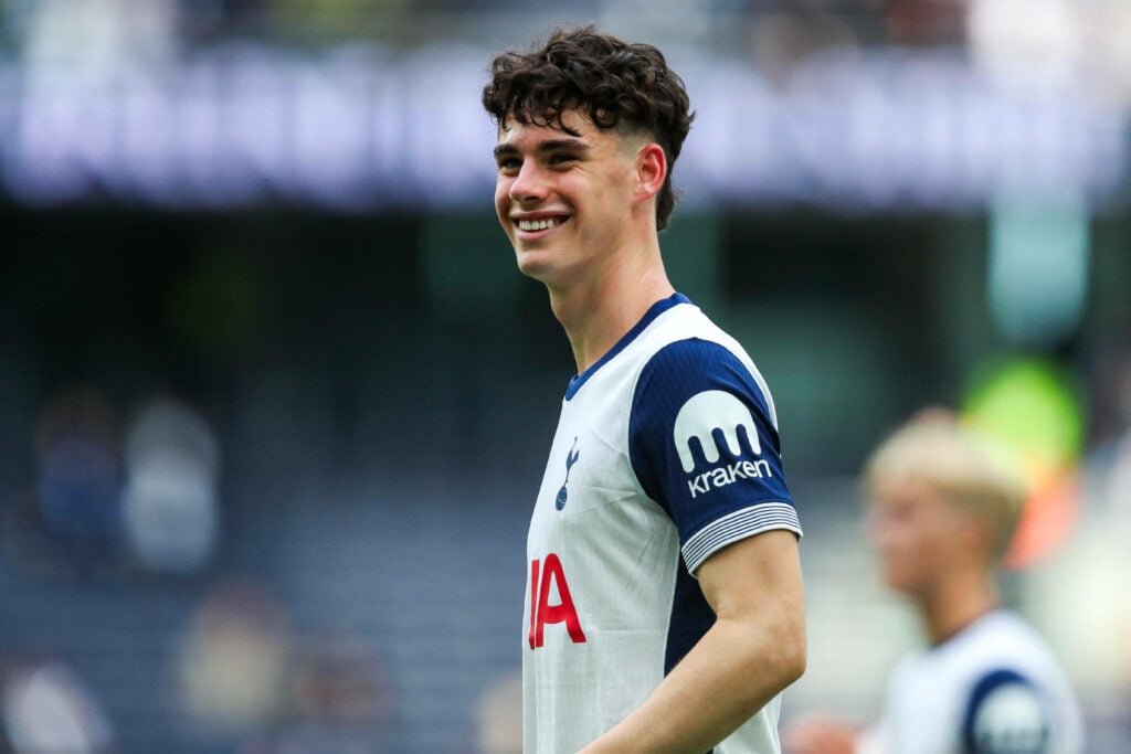 Tottenham midfielder Archie Gray smiles