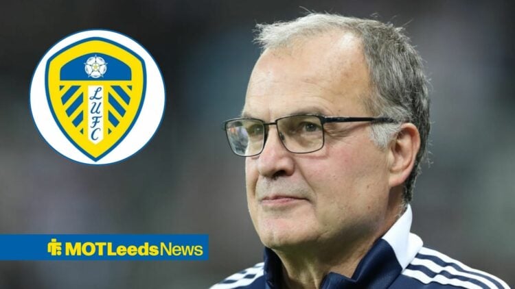 Marcelo Bielsa looking at the Leeds United badge.