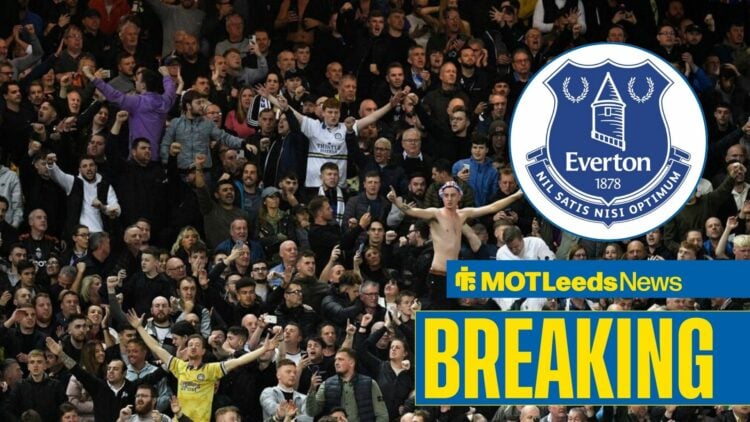 Leeds fans singing in the direction of the Everton badge.