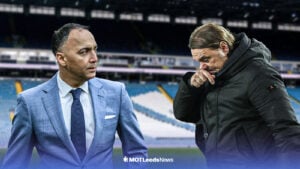 Paraag Marathe looks towards Daniel Farke, with Elland Road in the background