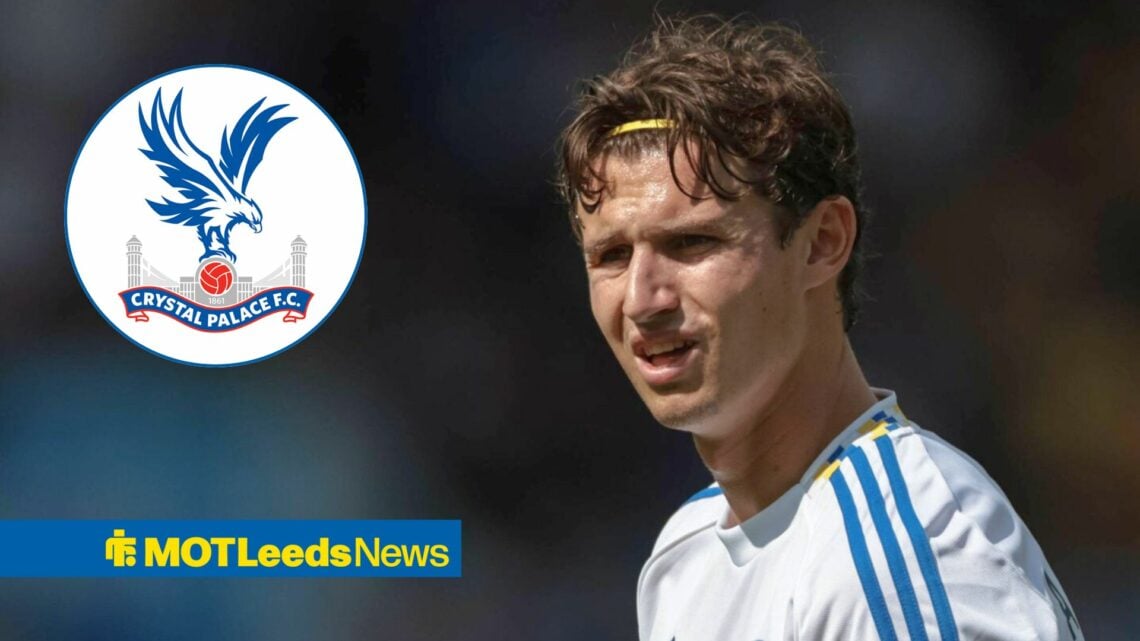 Brenden Aaronson looking annoyed towards a circle inset of the Crystal Palace badge