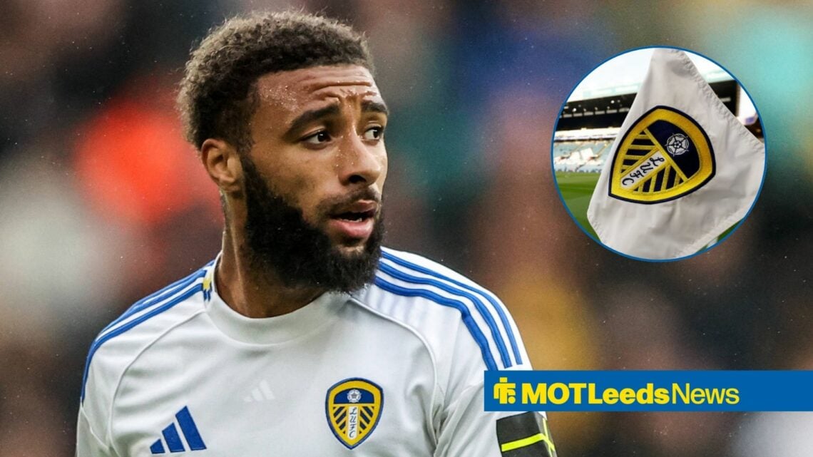 Jayden Bogle looking at Leeds flag in circle