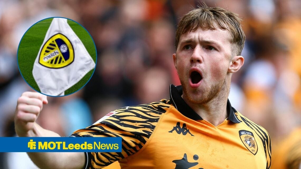 Joe Gelhardt looking at a corner flag with the Leeds United badge on.