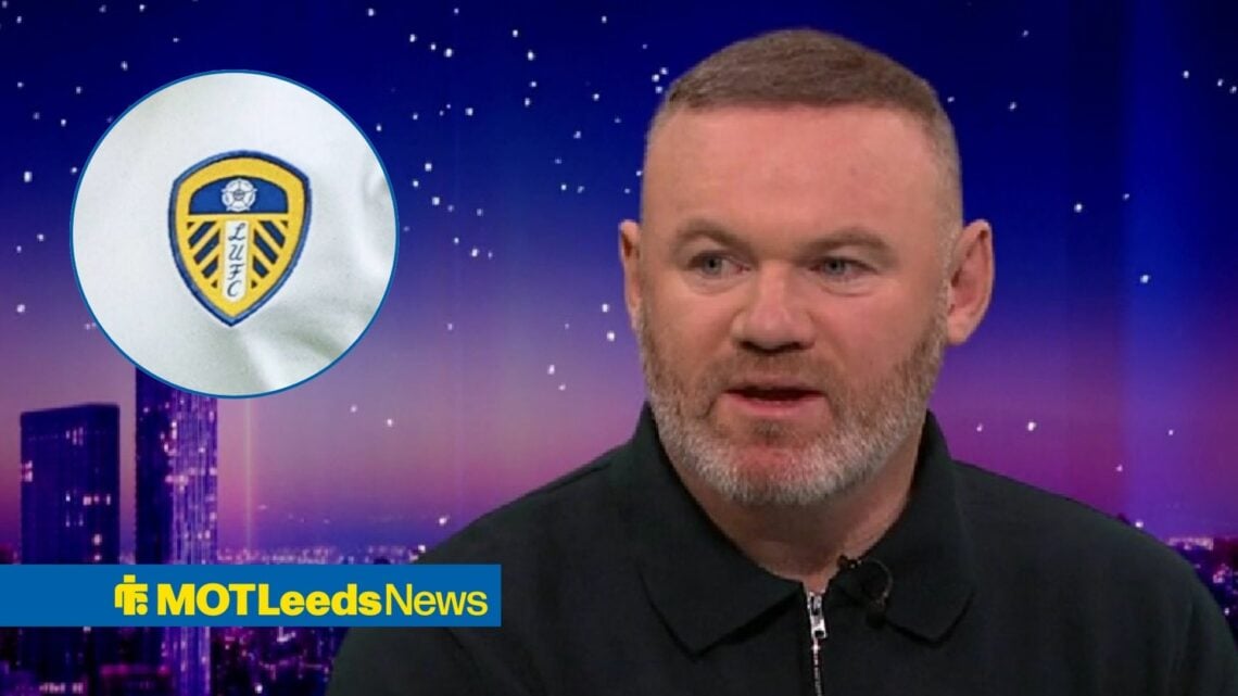 Wayne Rooney looking in direction of Leeds badge.