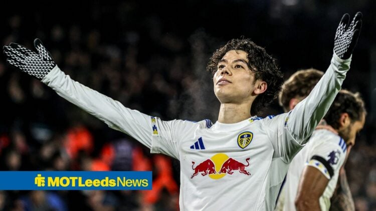 Ao Tanaka holds his arms aloft playing for Leeds