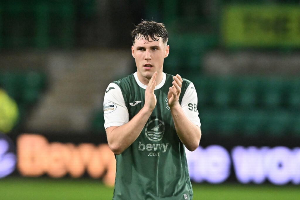 Josh Mulligan applauding at full-time of Hibernian match