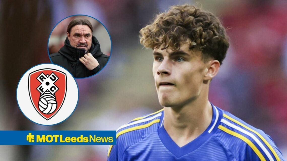 Harry Gray looking in the direction of Daniel Farke and the Rotherham United badge.