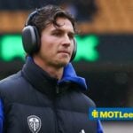Wolverhampton Wanderers FC v Leeds United FC, Premier League Brenden Aaronson Of Leeds United inspects the pitch ahead of Wolverhampton Wanderers FC v Leeds United FC English Premier League match at Molineux Stadium, Wolverhampton, England, United Kingdom on 20 September 2025