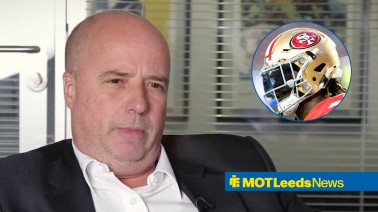 Leeds board member Andreas Dracopoulos in an interview, San Francisco 49ers player in a helmet.