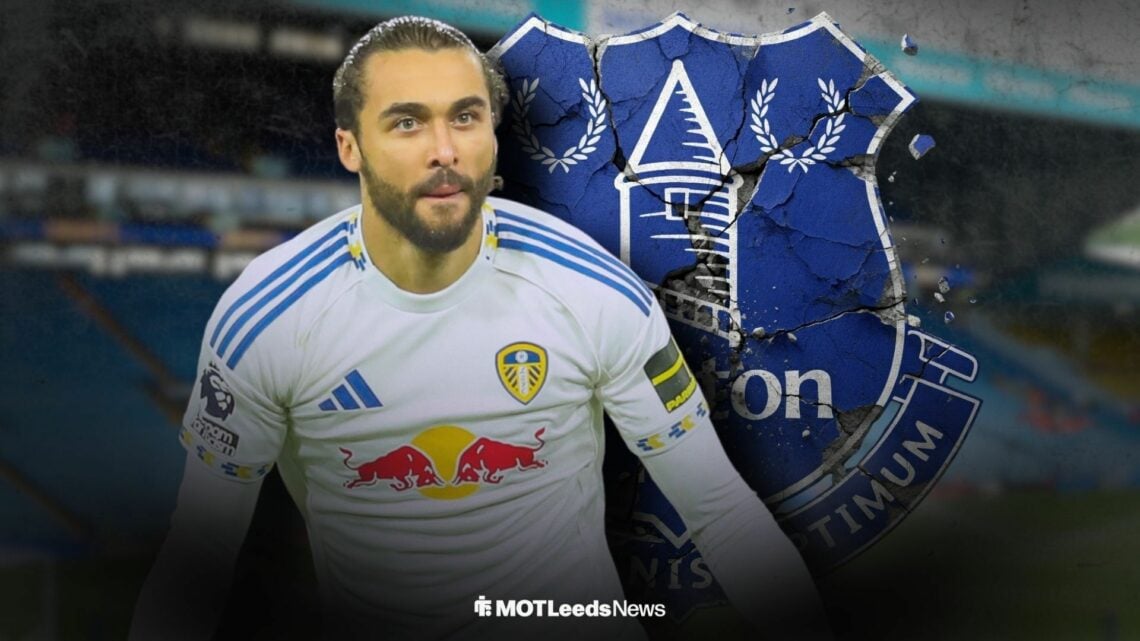 Dominic Calvert-Lewin celebrating for Leeds United, cracked Everton badge behind him.