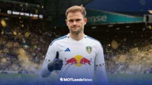 Southampton star Leo Scienza in a Leeds United shirt inside of Leeds United's stadium, Elland Road.