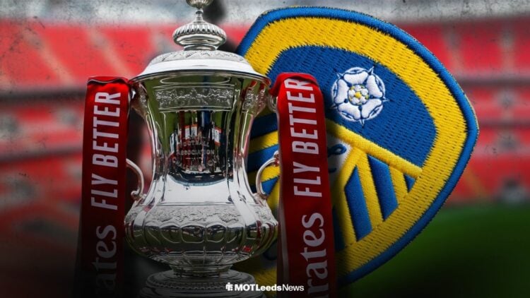 The FA Cup trophy next to a Leeds United badge at Wembley Stadium
