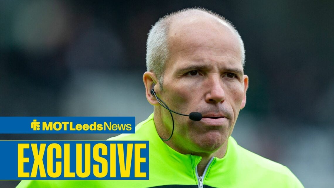 Assistant referee Richard West is pictured warming up before a match