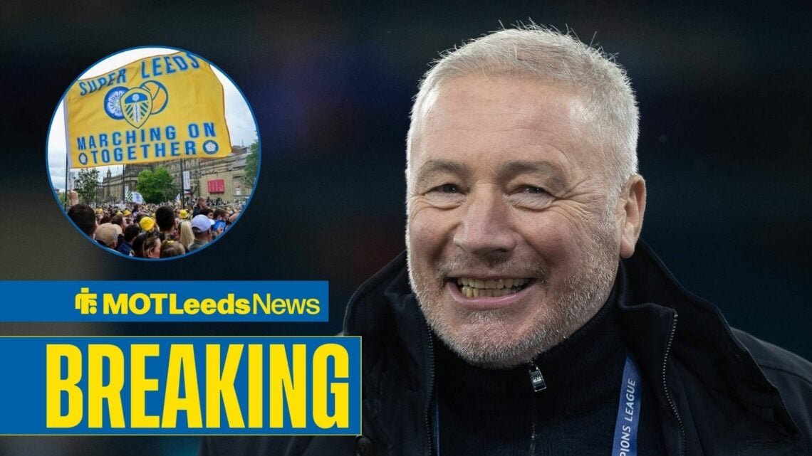 Ally McCoist smiling in the direction of Leeds United fans.