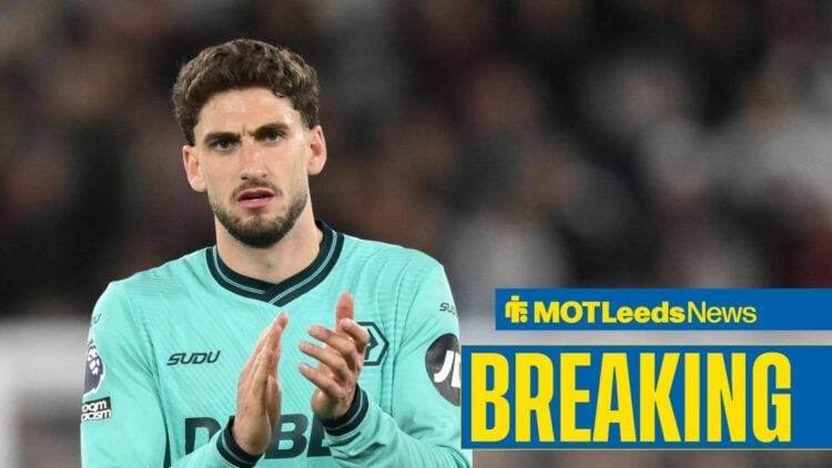 Santiago Bueno in action for Wolves, applauding fans