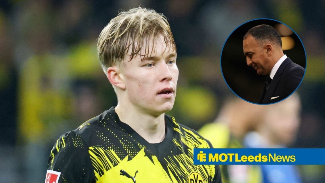 Daniel Svensson looking ahead for Borussia Dortmund with Paraag Marathe looking at the floor