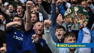 Leeds United fans looking angry towards a circle inset of Crystal Palace lifting the Conference League trophy
