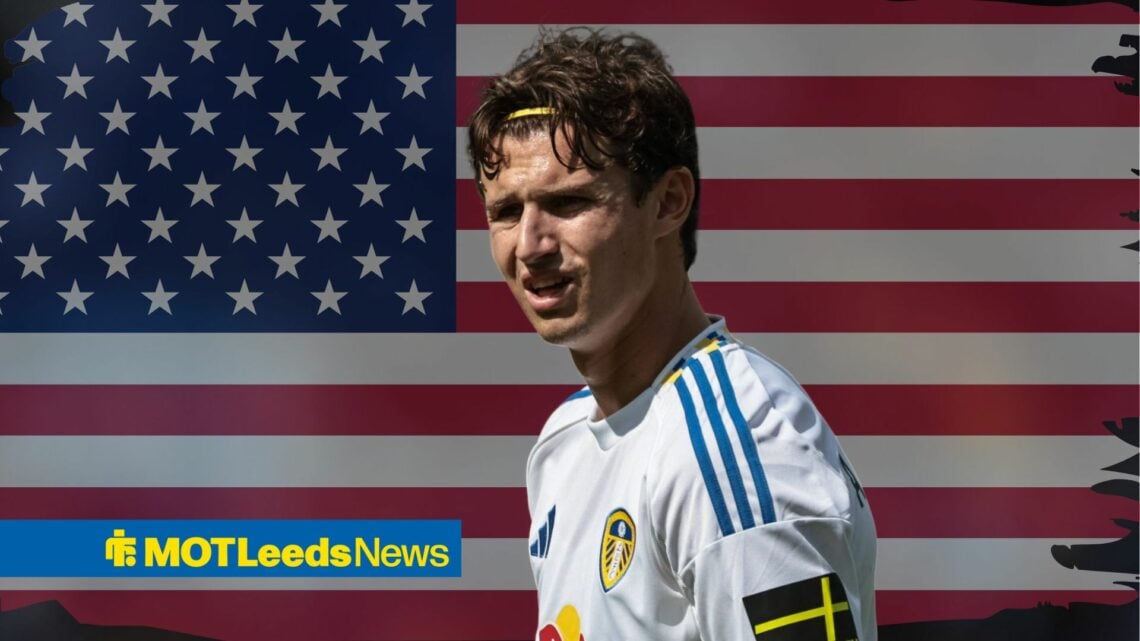 Brenden Aaronson looking miserable playing for Leeds United, United States flag in background.