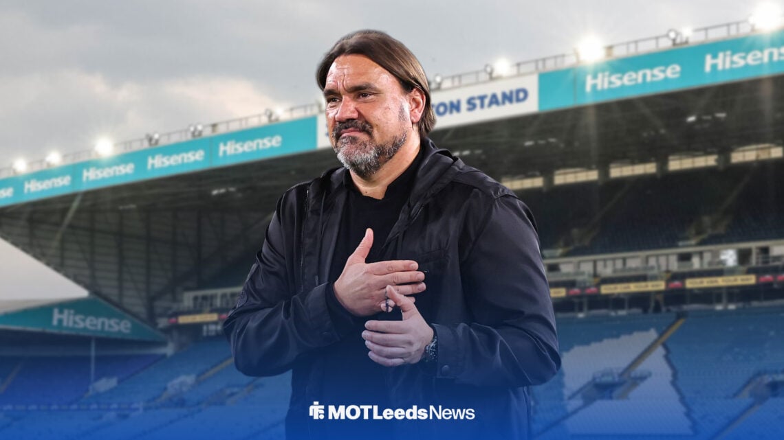 Daniel Farke taps his heart, with Elland Road behind him