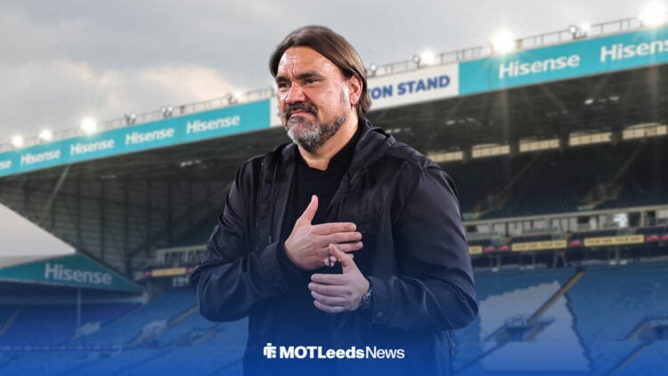 Daniel Farke taps his heart, with Elland Road behind him