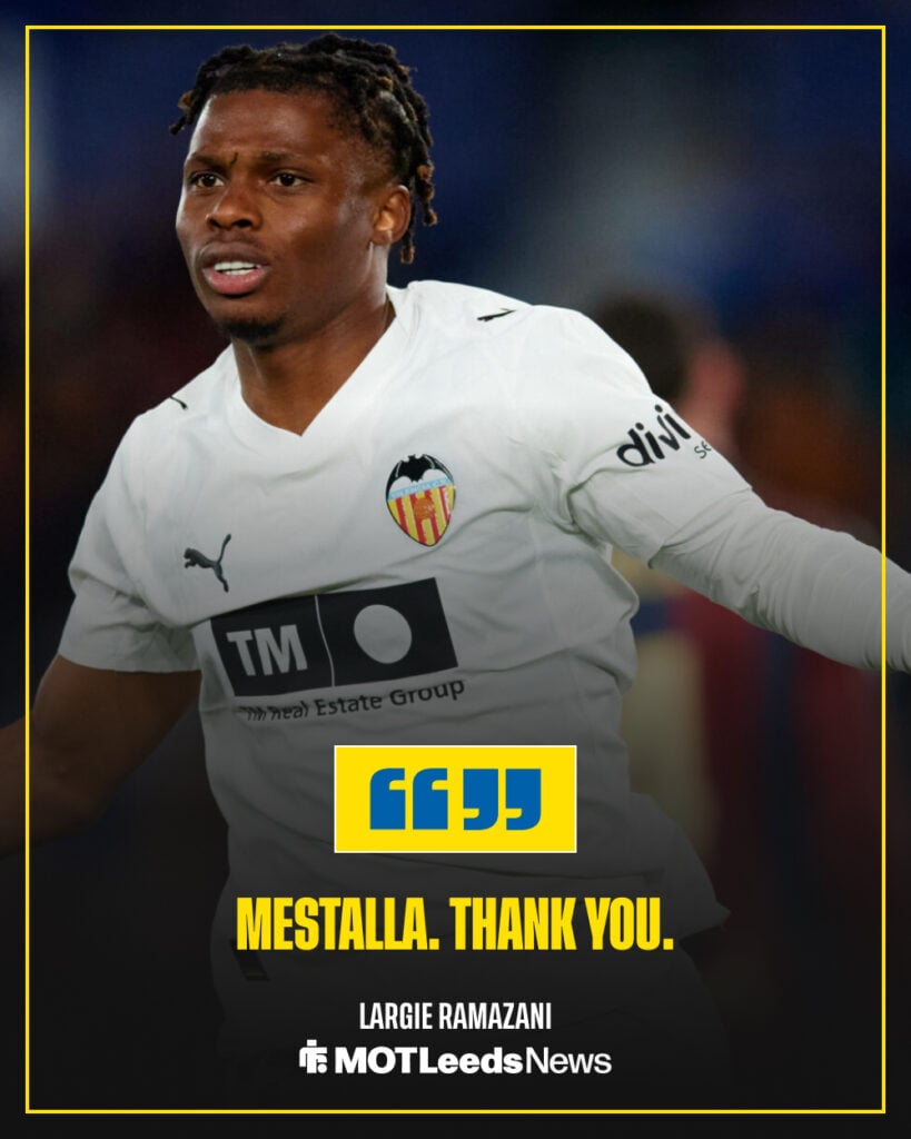 Largie Ramazani celebrating in Valencia home shirt with quote