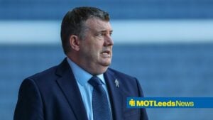 Ron Gourlay looking on.